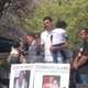 Matt Barnes holding one of Stephon Clark’s sons at a rally he initiated on March 31, 2018, in Sacramento, Calif.